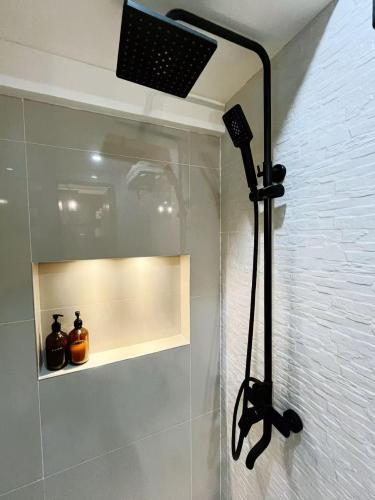 a shower in a bathroom with a shower at C&G Staycation Home in General Trias