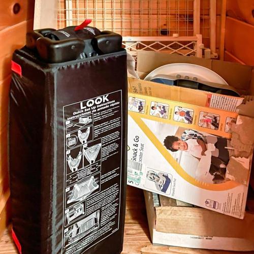 a box sitting on a table next to a box of appliances at Kate's Cabin - 3 min to Dollywood! Cabin with Hot tub, Game Room, and Resort Pool! in Sevierville
