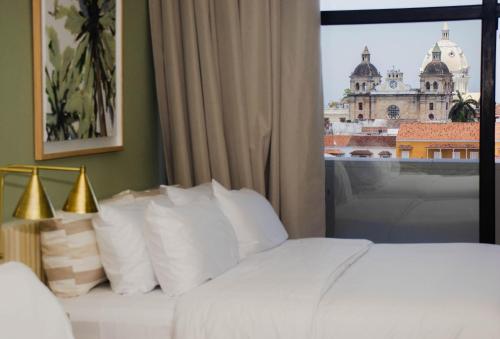 Ένα ή περισσότερα κρεβάτια σε δωμάτιο στο Terrazas Hotel Boutique
