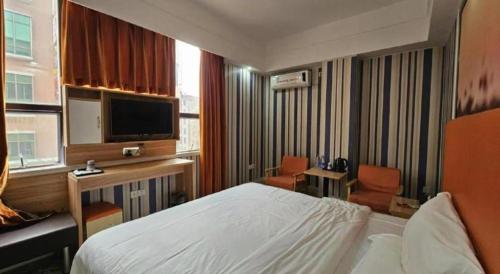 Televisyen dan/atau pusat hiburan di PAI Hotel·Huazhou Bus Terminal