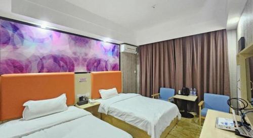 Katil atau katil-katil dalam bilik di PAI Hotel·Huazhou Bus Terminal