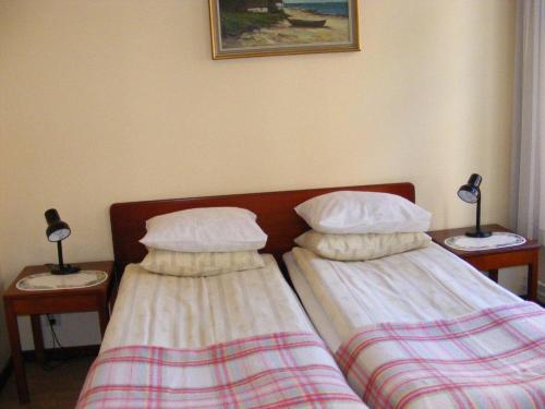 Postel nebo postele na pokoji v ubytování Hotel Continental Malmö
