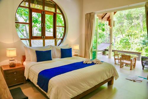 Katil atau katil-katil dalam bilik di Purana Resort Koh Yao Noi - SHA Extra plus