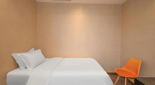 Postel nebo postele na pokoji v ubytování PAI Hotels Shijiazhuang Zhengding Gucheng