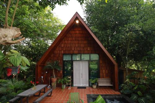 Κήπος έξω από το Kenaray Farmstay riverside