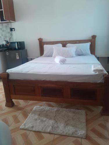 Postel nebo postele na pokoji v ubytování Kelly Homes