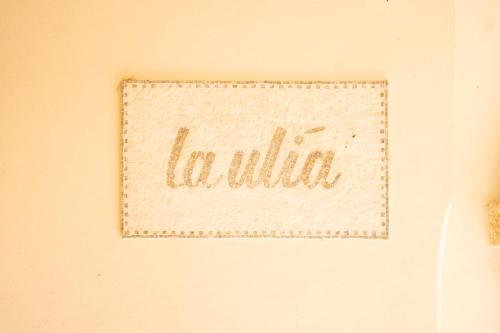 a sign on a wall with the word liliilli at LA ULIA by SALENTO OASIS in Copertino