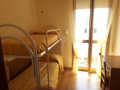 Katil atau katil-katil dalam bilik di Hotel Mariani