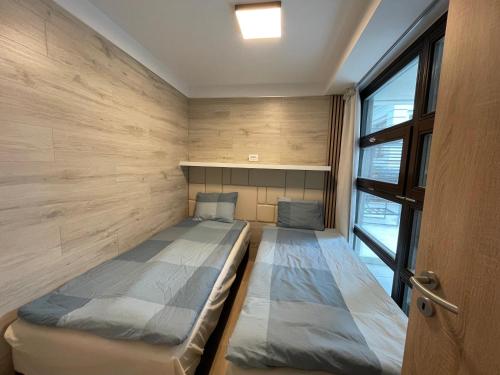 Ένα ή περισσότερα κρεβάτια σε δωμάτιο στο Jókai24