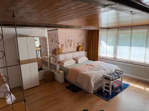 Katil atau katil-katil dalam bilik di Gemütliches-Gästezimmer