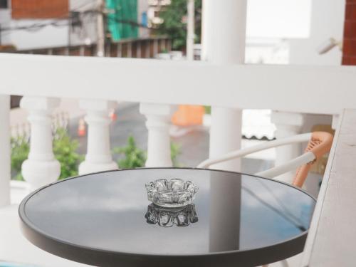 a ring sitting on top of a glass table at Boxsoon Nimman 2 # 4beds 3baths in Chiang Mai