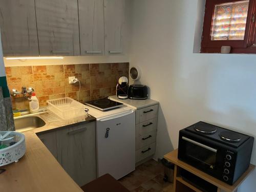 Köök või kööginurk majutusasutuses Studio Apartman Skyline