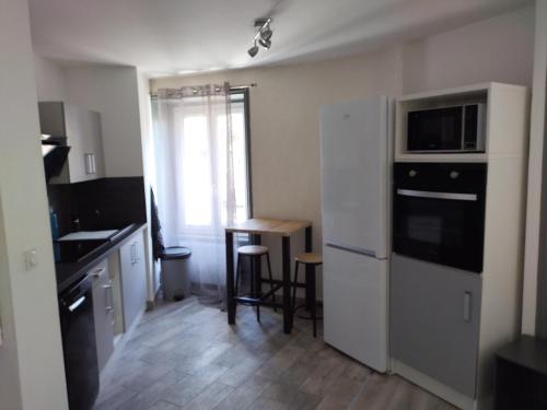 Η κουζίνα ή μικρή κουζίνα στο Appartement Monton