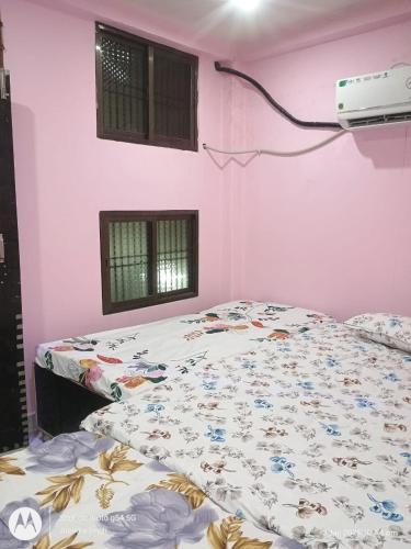 Katil atau katil-katil dalam bilik di Shlok homestay