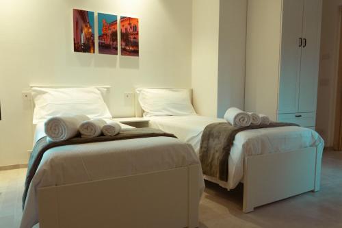 Una cama o camas en una habitación de Siclea