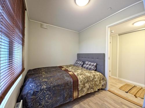 Ένα ή περισσότερα κρεβάτια σε δωμάτιο στο Modern brand new apartment