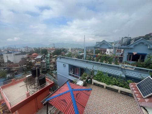 a view of a city from the roof of a building at Laxmi Homestay in Tānsing