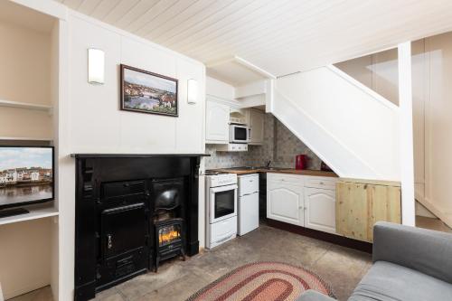 Kuchyň nebo kuchyňský kout v ubytování Discovery Cottage