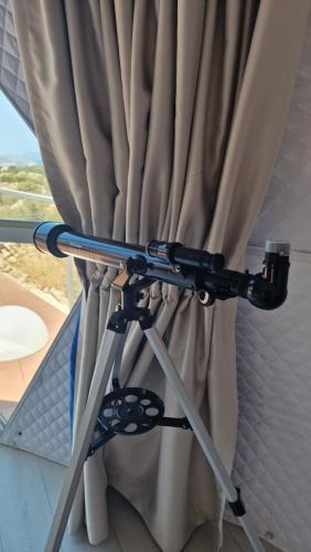a curtain frame with a camera on top of it at Dome Bally Kampia in Kambiá