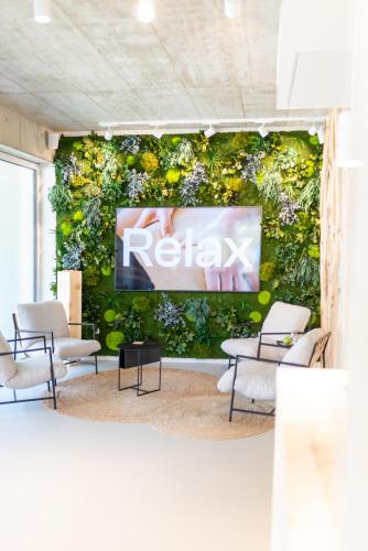 TV a/nebo společenská místnost v ubytování RELAXANS Wellness & Hotel