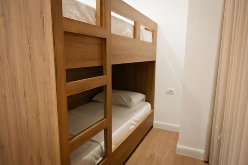 a bunk bed room with a bunk bed in a room at Vila Venezia in Shëngjin