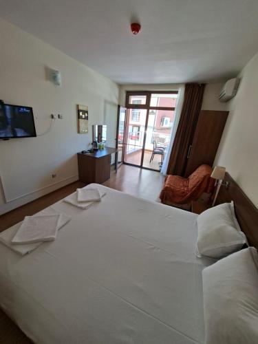 Ένα ή περισσότερα κρεβάτια σε δωμάτιο στο Guest House Skalite