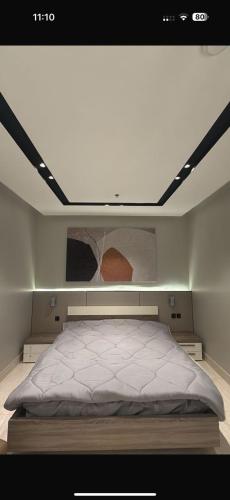 Postel nebo postele na pokoji v ubytování استيديو جاكوزي قريب من البحر