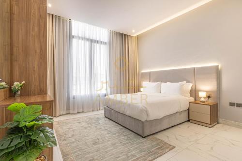 Postel nebo postele na pokoji v ubytování Amber Hospitality - Al Aarid
