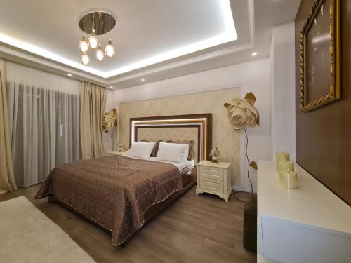 Ένα ή περισσότερα κρεβάτια σε δωμάτιο στο Urban Elegance Tirana