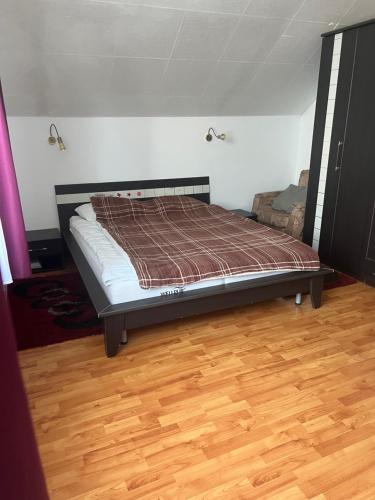 Un pat sau paturi într-o cameră la Casa Stefania