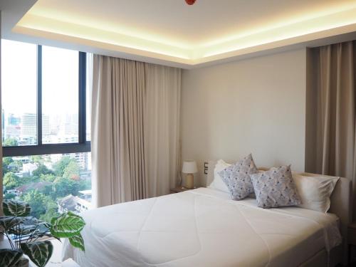 Postel nebo postele na pokoji v ubytování Circle Sukhumvit31 Bangkok #2BR #5ppl