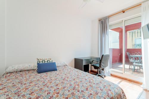 En eller flere senge i et værelse på La Korolada Guesthouse