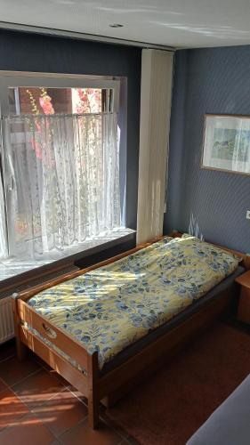 Postel nebo postele na pokoji v ubytování Ferienwohnung Rhede No 1 im EG