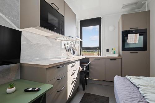 Kuchyň nebo kuchyňský kout v ubytování EcoStay Comfort in compact format nr two