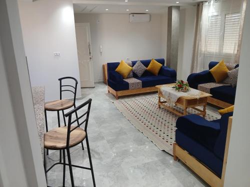 Ein Sitzbereich in der Unterkunft appartement l 'Oasis