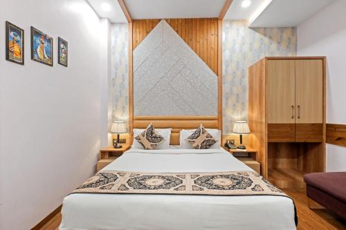 a bedroom with a bed in a room at PRIME LAND in Varanasi