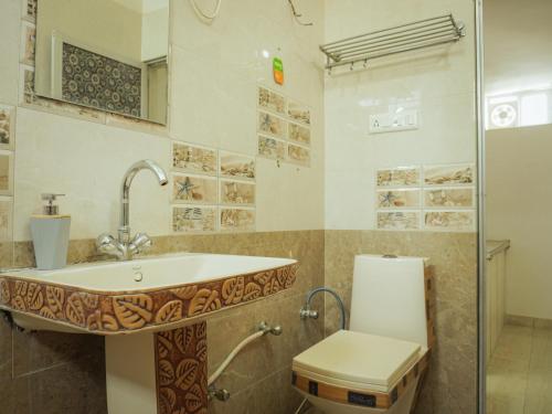 a bathroom with a sink and a toilet at Mama Killa Studio,1BHK,Apartment in Pushkar