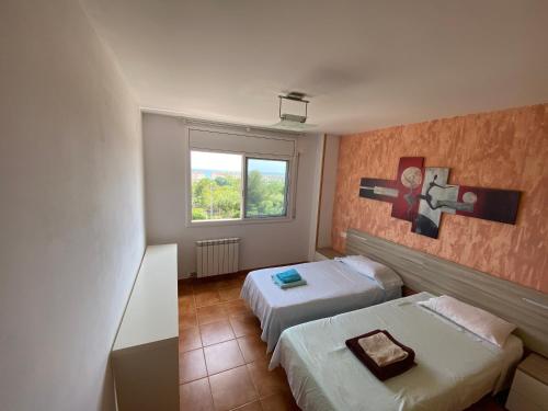 Ένα ή περισσότερα κρεβάτια σε δωμάτιο στο Casa con vistas al mar