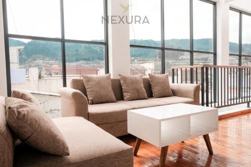 Posezení v ubytování Limaran Syariah Nexura Collection