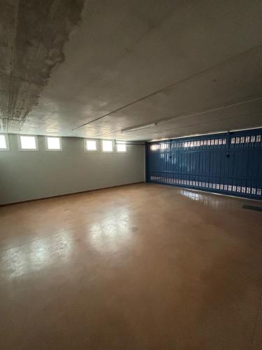 an empty room with a empty floor and windows at Villa Orchidea in Onno