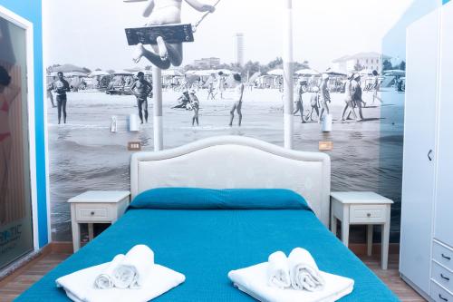 Posteľ alebo postele v izbe v ubytovaní Hotel Adriatica sul Mare