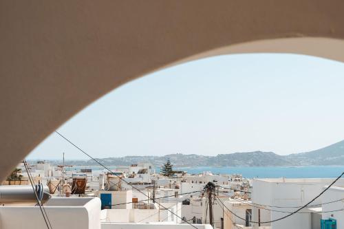 a view of a city from a building at Emery Hotel in Naxos Chora
