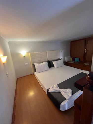 Ένα ή περισσότερα κρεβάτια σε δωμάτιο στο Vlycha Beach Apartments