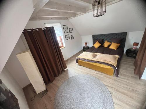 Postel nebo postele na pokoji v ubytování Appartement duplex en Alsace