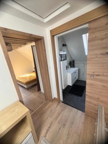Kuchyň nebo kuchyňský kout v ubytování Appartement duplex en Alsace