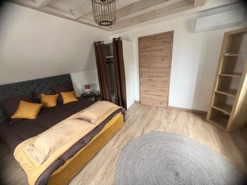 Postel nebo postele na pokoji v ubytování Appartement duplex en Alsace