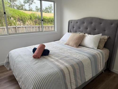 Ένα ή περισσότερα κρεβάτια σε δωμάτιο στο Cozy 4B Villa close to Theme Park