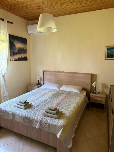 Кровать или кровати в номере Villa Alexandros