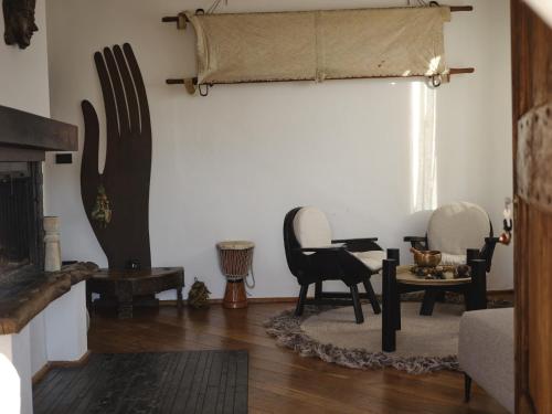 a living room filled with furniture and a window at Il Giardino Sopra le Nuvole in Città di Castello