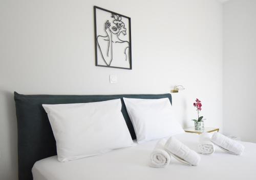 Una cama o camas en una habitación de Hotel Argilos